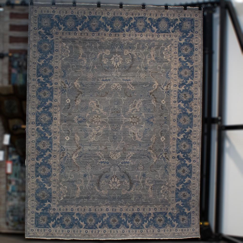 Hand- Knotted Blue Wool Rug