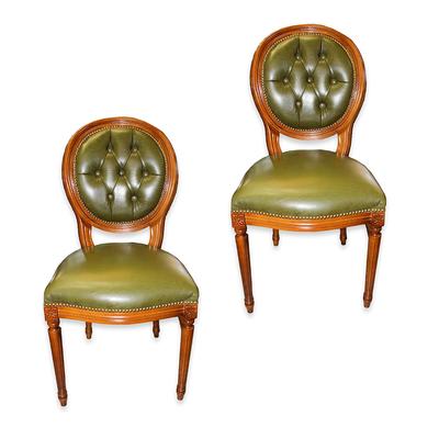 Pair of Luca Ferrari Green Chairs 