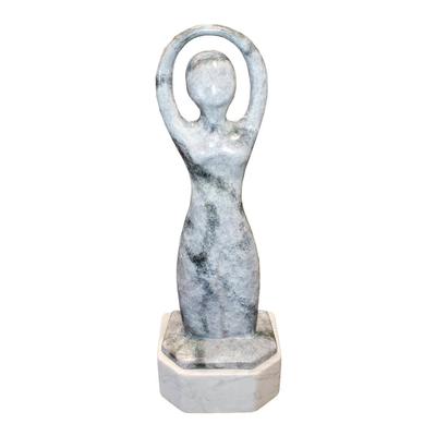 Marble Figurine on White Pedestal